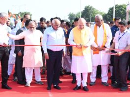 Amit Shah inaugurating development projects in Ahmedabad, including tree-planting under the Mission 3 Million Tree Scheme.