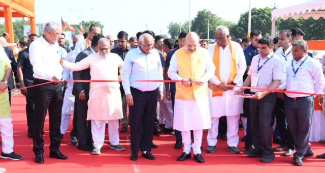 Amit Shah inaugurating development projects in Ahmedabad, including tree-planting under the Mission 3 Million Tree Scheme.